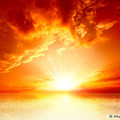 Red-sunset-over-the-sea-rich-in-dark-clouds-rays-of-light.jpg